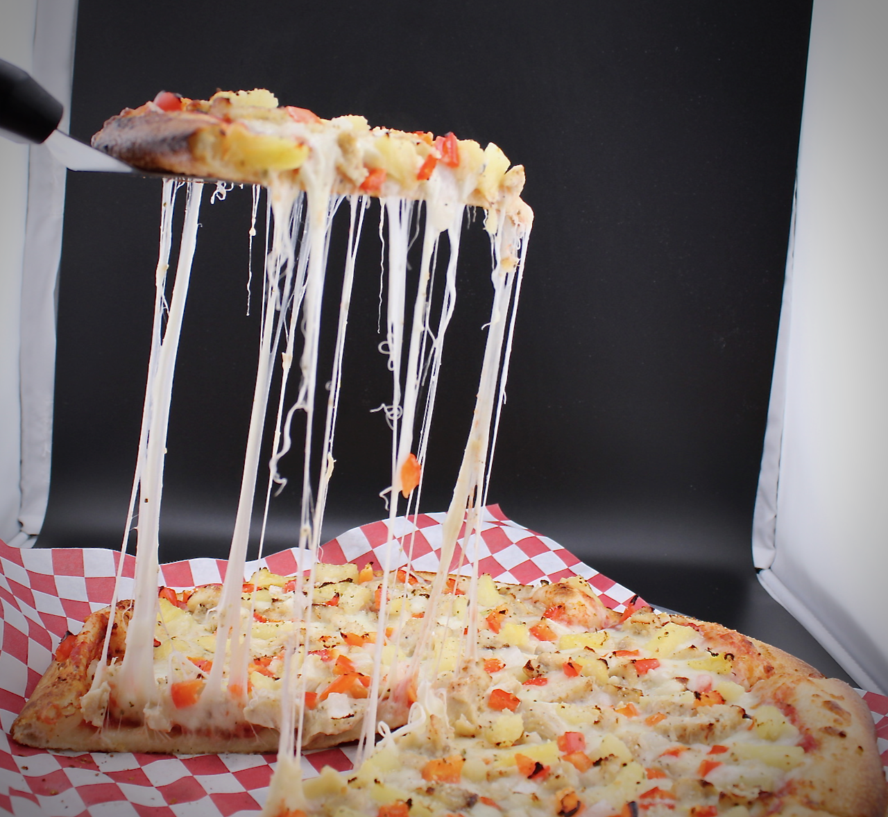 Pizza Meltdown Bacio cheese pull with premium mozzarella
