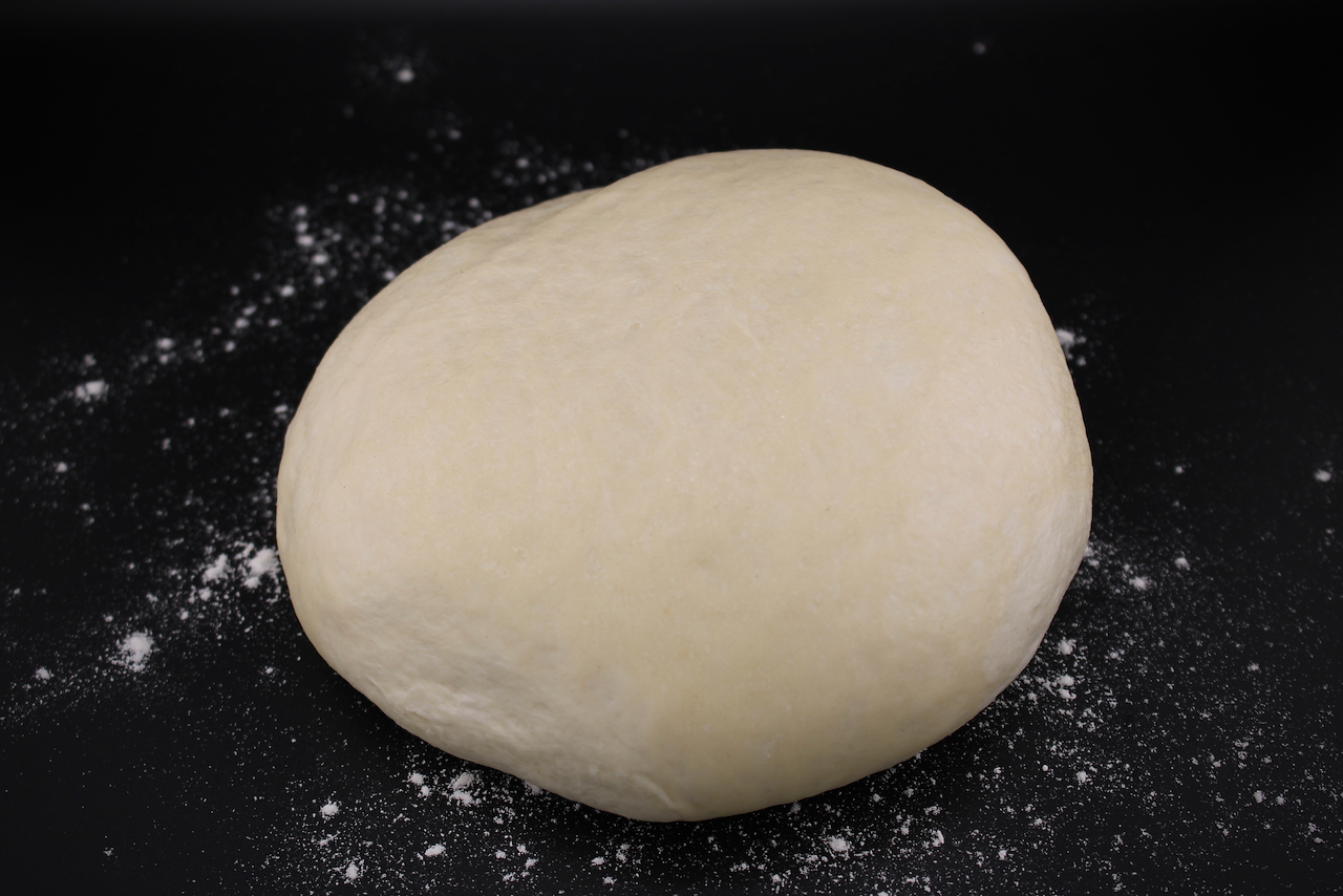 Handcrafted Pizza Meltdown dough prepared fresh